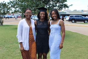 Gwen-Davis-and-family-at-grad-resized.jpg